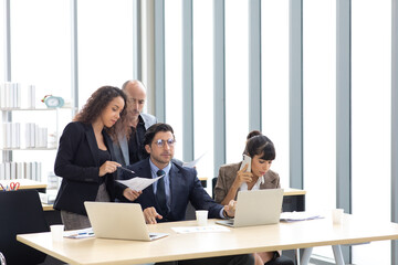 Business meeting. buiness team brainstorming. Diverse team of business people  cooperating on developing common design project