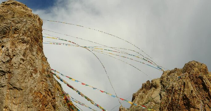 4k time lapse of huge clouds mass rolling over lake namtso & Tanggula snow mountain peak,tibet mansarovar,Tibet's second largest lake,is the third largest saltwater lake in China.Danggula(Tanggula) Mo