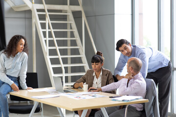 Business meeting. buiness team brainstorming. Diverse team of business people  cooperating on developing common design project