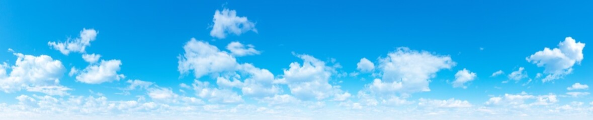 Blue Sky background with tiny Clouds. Panorama background