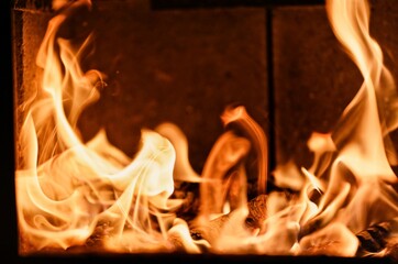 Fire in the fireplace in the vilage house