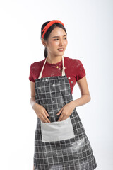Studio portrait attractive young woman wear apron making bakery on white background
