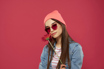 gorgeous brunette in pink hat red flower luxury isolated background