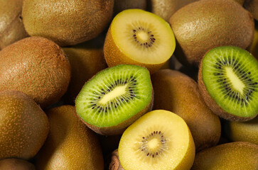 Kiwifruit Background Green And Yellow Kiwi - 450299149