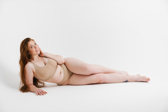 Young White Plus Size Woman In Lingerie Posing