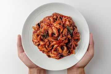 Stir-fried Webfoot octopus on a white background