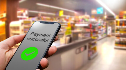 Contactless payment with a smartphone using an online payment service in the grocery store,...