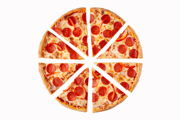 Pizza cut into pieces, isolate