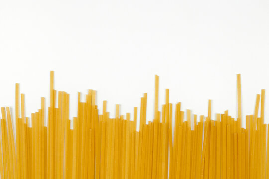 Uncooked spaghetti, bunch of italian pasta