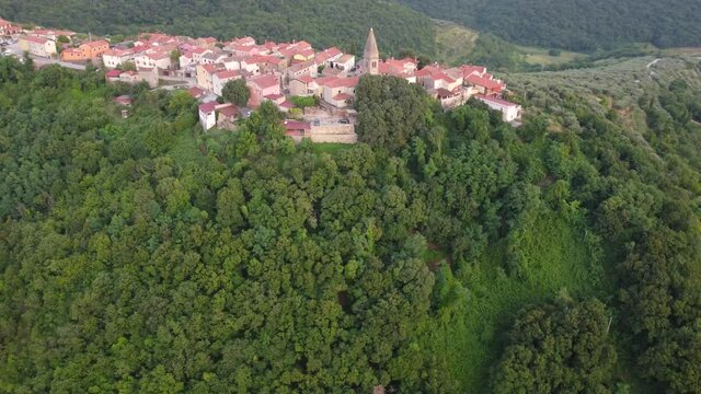 Aerial view of typical old Istrian village Padna on a hill in summer, Slovenia
