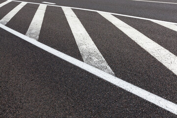 paved road with white road markings for transport management