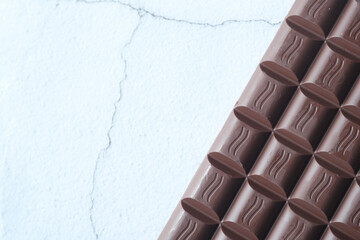 dark chocolate on a plate on white background 