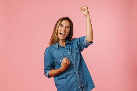 Portrait Of A Casual Happy Mid Aged Woman Standing Isolated