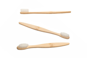 Bamboo toothbrush isolated on a white background.