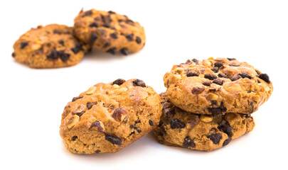 cookies with chocolate and hazelnuts on a white background