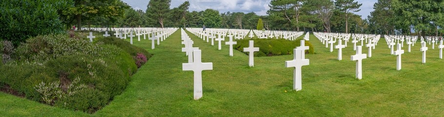 Colleville-Sur-Mer, France - 08 03 2021: Normandy American Cemetery and Memorial and the white crosses - obrazy, fototapety, plakaty