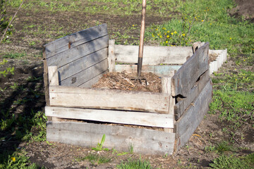 Compost pile made of wood