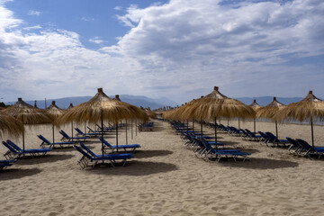 Tourist beaches on the Adriatic coast of Albania are clean and full of parasols,