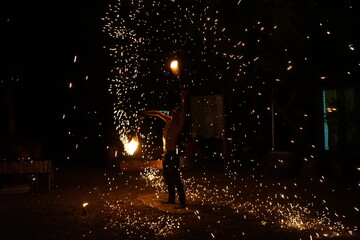 Fire man dance show power beach