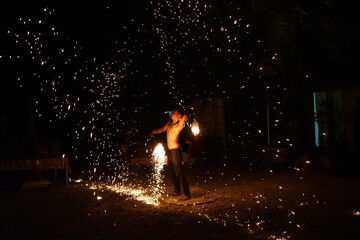 Fire man dance show power beach