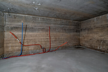 Empty basement room with minimal preparatory repairs. interior with white brick walls