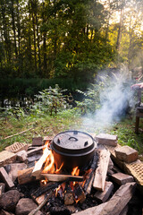 Dutch oven cooking on a campfire
