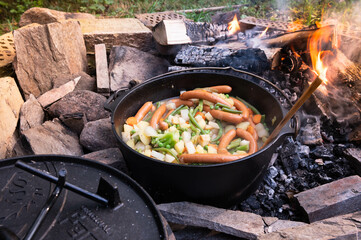 Dutch oven cooking on a campfire