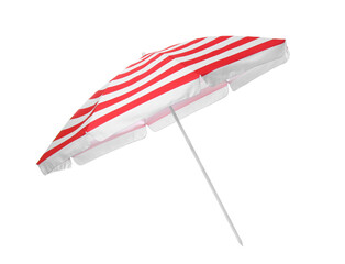Open red striped beach umbrella isolated on white - obrazy, fototapety, plakaty