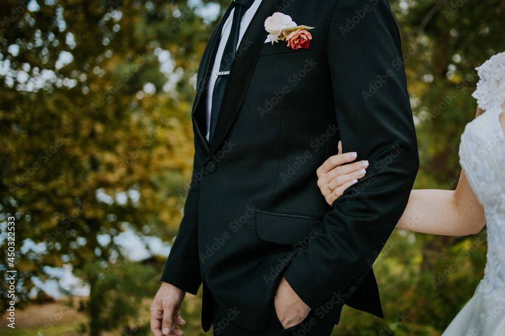 Poster Bride and the groom during their wedding ceremony