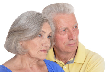 Portrait of sad senior couple isolated