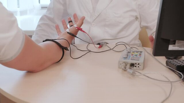 Patient nerves testing using electromyography at medical center