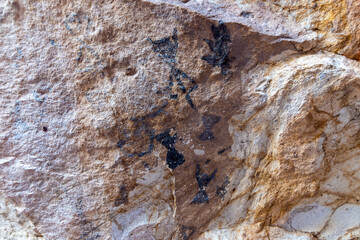 Rock paintings on the cave walls. Huarpes people in Mendoza, Argentina.