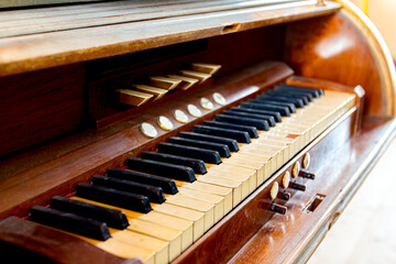Old wooden organ keyboard