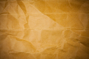 Old torn crumpled paper bag texture background.