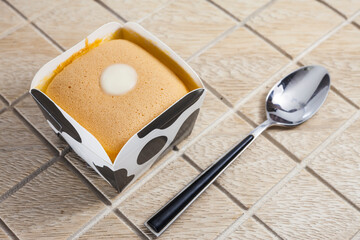 Orange Cake on Cow Cup.