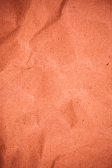 Red crumpled packaging paper background.