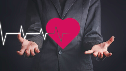 Health care, organ donation, life insurance, world heart day, world health day concept. Hand...