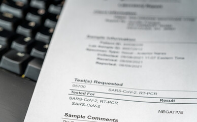 Paper printout showing a negative result for PCR test on nasal swab for SARS-CoV-2 or Covid-19