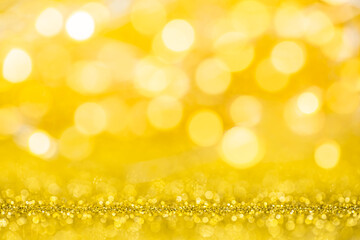 Abstract gold texture glitter lights background. de-focused.