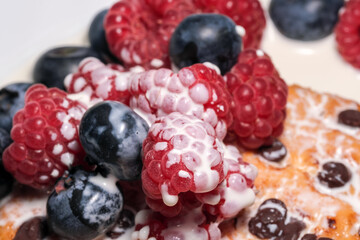 Mix of sweet berries with cream