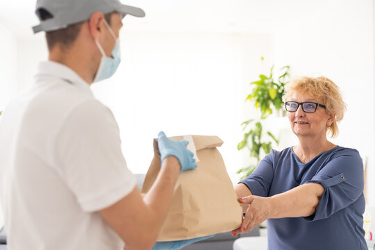 Food delivery to an elderly woman during quarantine Coronavirus Covid-19 epidemic