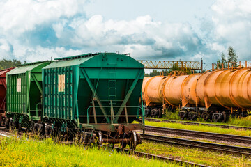 Fototapeta na wymiar Grain carrier freight car for transportation of bulk cargo of grain crops