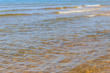 Soft wave of sea on sandy beach