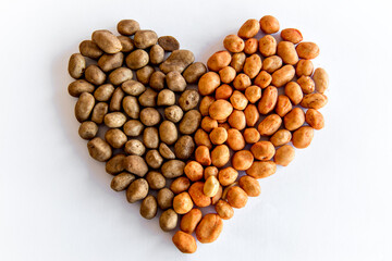 Peanuts heart on white background.