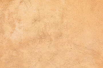 Fototapeta na wymiar background of orange plaster wall