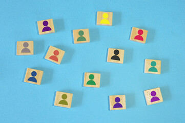 Different color of human symbol on wooden blocks. Different skills and different abilities concept.