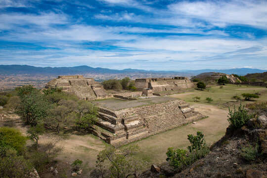 View of the ancient ruins of the Monte Albán pyramid complex in Oaxaca, Mexico