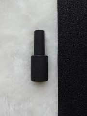 gel nail polish, cosmetics, minimalism on the background