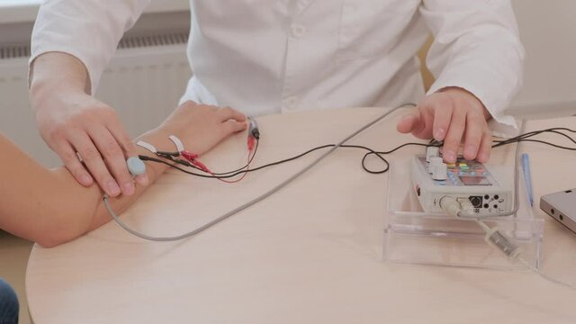 Patient nerves testing using electromyography at medical center