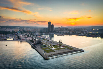 Aerial landscape of the harbor with modern architecture and Gdynia city inscription at sunset. Poland.